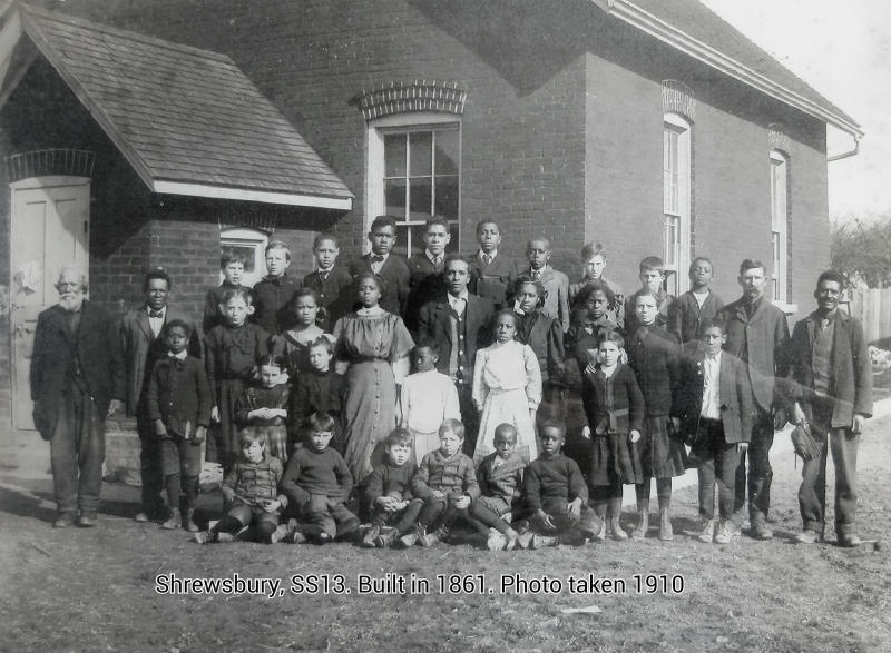 Photograph of Shrewsbury SS13, the integrated school Addison J. Smith helped establish. The photograph was taken in 1910. Image courtesy of Shrewsbury Community Association. Photograph of Black and White students and teachers.