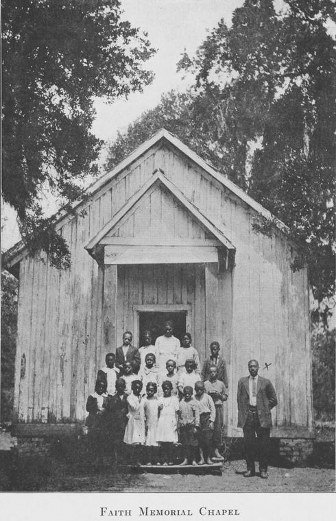 Group standing in front of a church